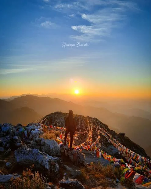 George Everest summit with prayer flags